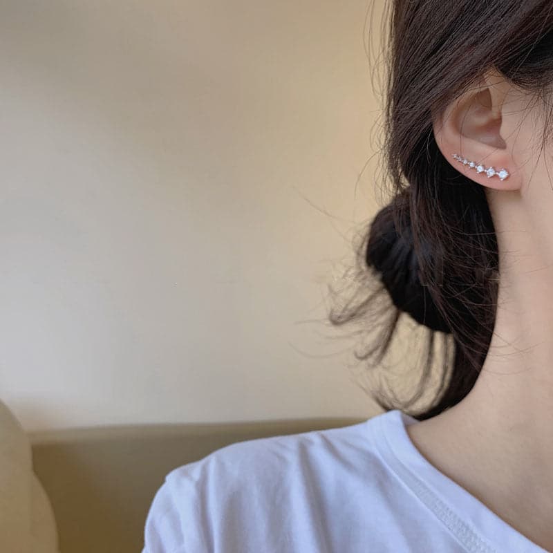 Océane - Boucles d'oreilles sept étoiles scintillantes