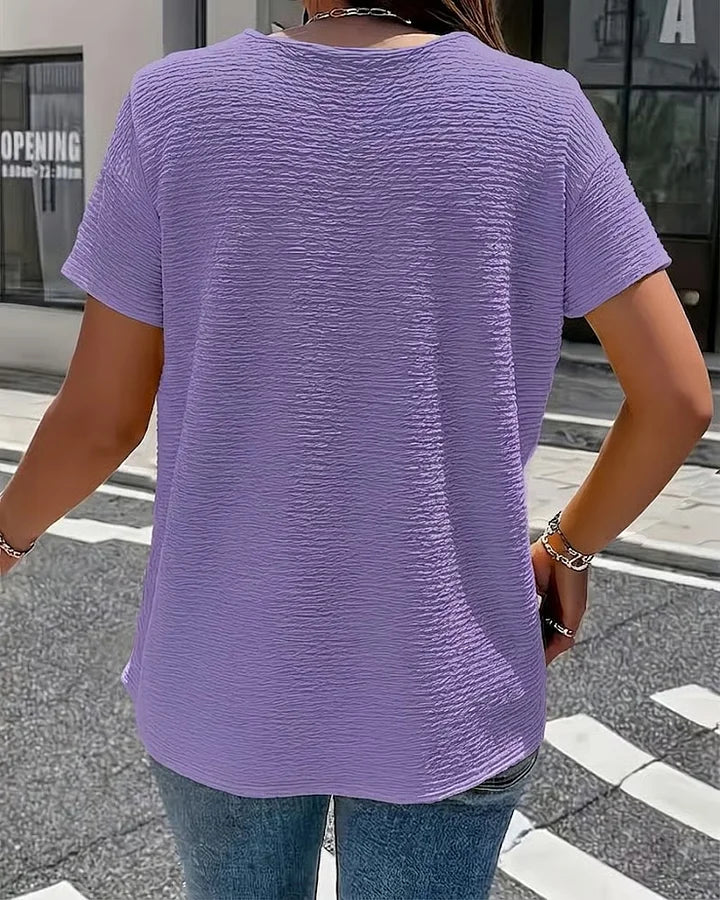 Syzelle - T-shirt femme col rond texturé manches courtes boutons décoratifs élégant
