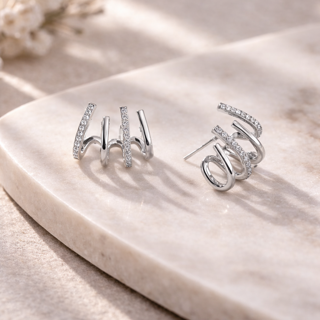 Evarune - Boucles d’Oreilles Femme Design Spirale Zirconiums Élégance Moderne