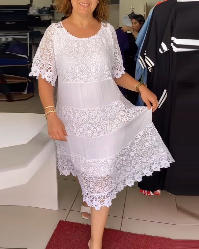 Isis - Robe en dentelle unie à manches courtes