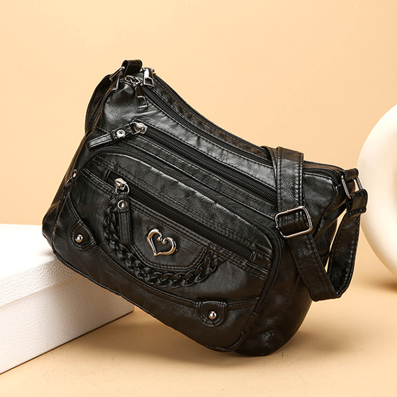 Quixelle - Sac bandoulière femme en cuir PU souple avec multiples poches