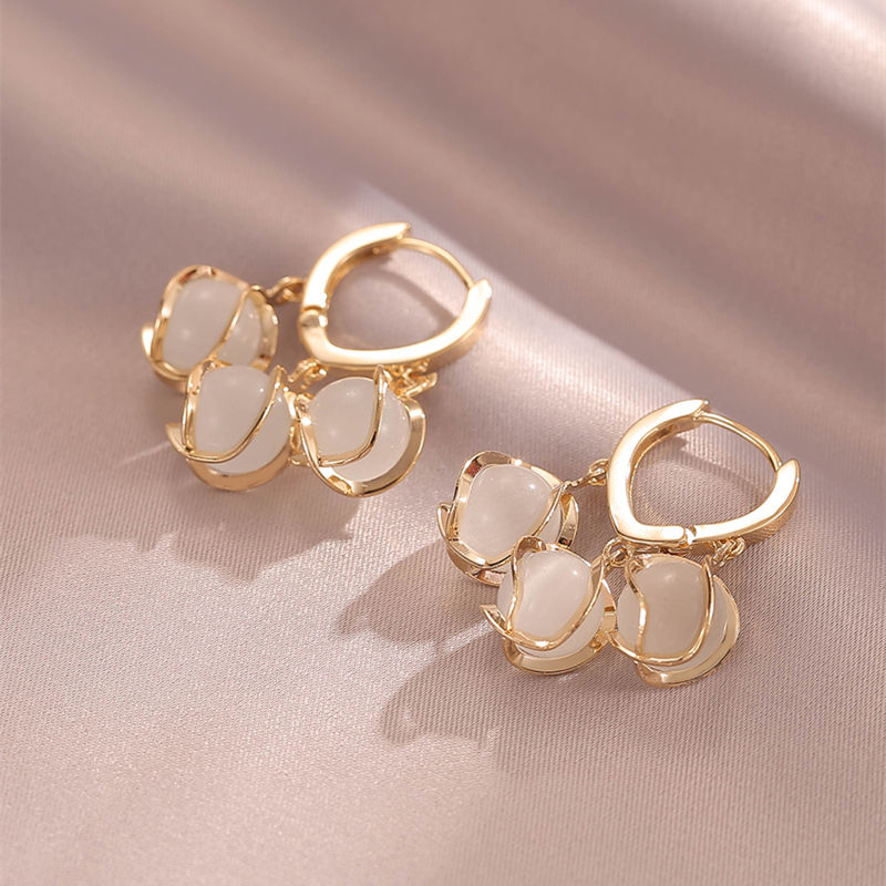 Roselisse - Boucles d’oreilles en cristal de pierre de lune avec design plaqué or