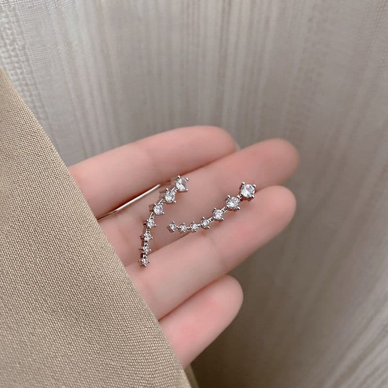Océane - Boucles d'oreilles sept étoiles scintillantes
