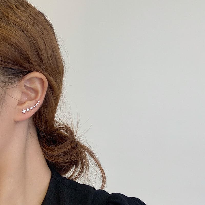 Océane - Boucles d'oreilles sept étoiles scintillantes