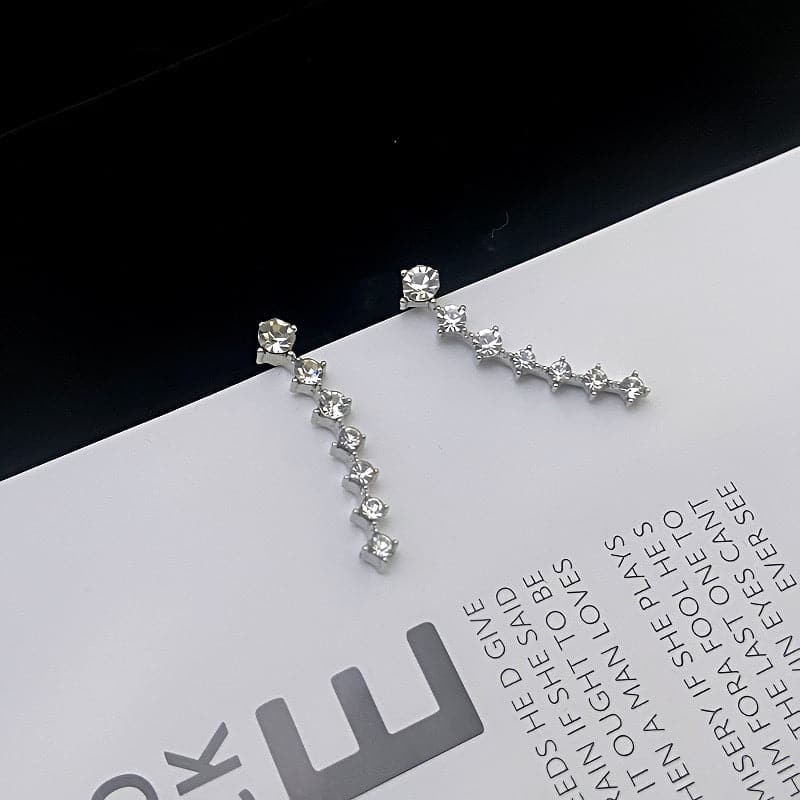 Océane - Boucles d'oreilles sept étoiles scintillantes
