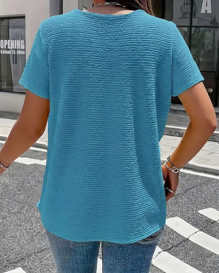 Syzelle - T-shirt femme col rond texturé manches courtes boutons décoratifs élégant