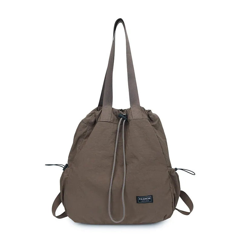 Nell - Sac à dos femme convertible avec cordon ajustable pratique