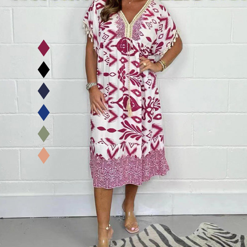 Juline - Robe décontractée imprimée avec décolleté en V et franges sur les manches courtes
