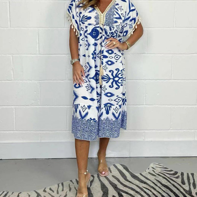 Juline - Robe décontractée imprimée avec décolleté en V et franges sur les manches courtes