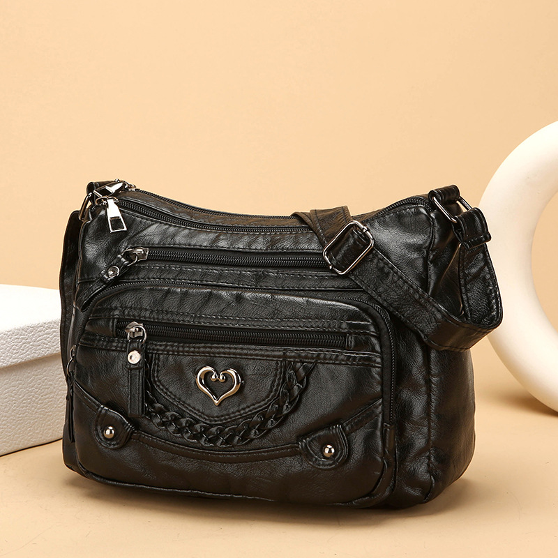 Quixelle - Sac bandoulière femme en cuir PU souple avec multiples poches