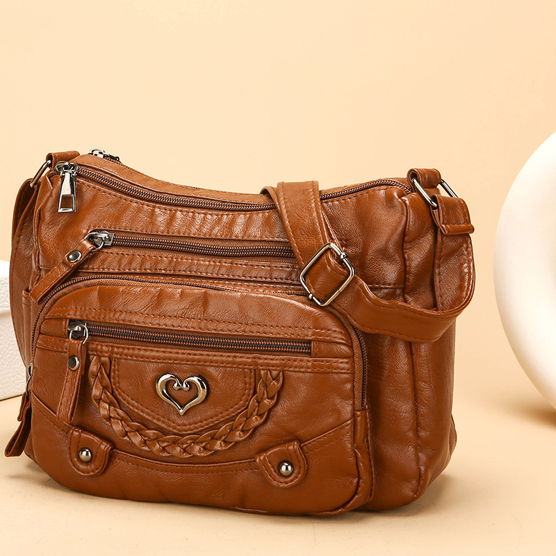Quixelle - Sac bandoulière femme en cuir PU souple avec multiples poches