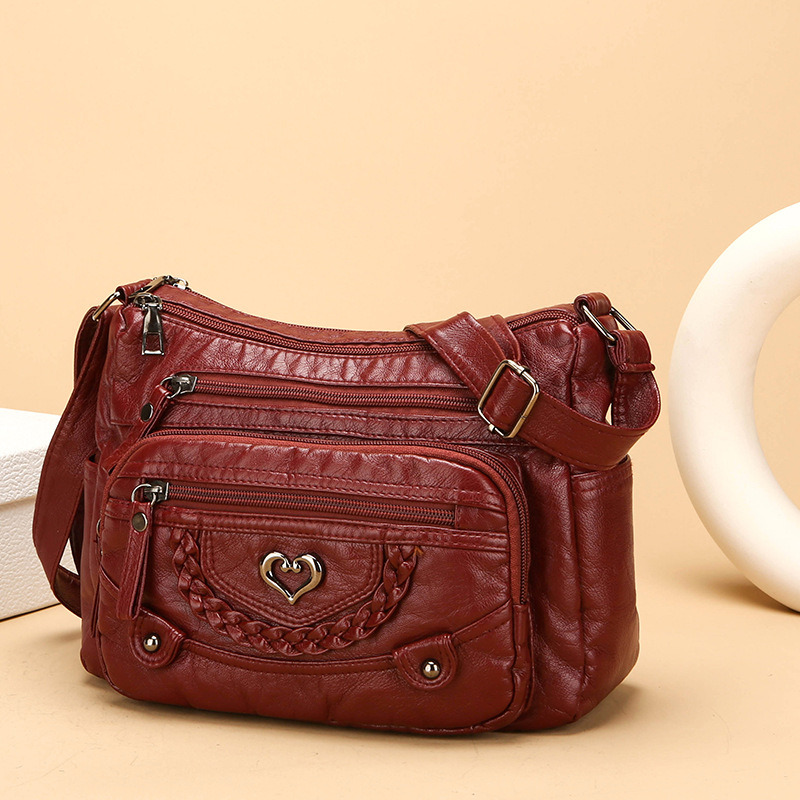Quixelle - Sac bandoulière femme en cuir PU souple avec multiples poches