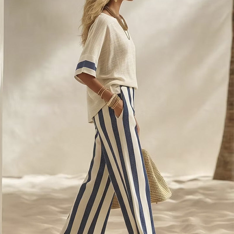 Uma - Ensemble femme deux pièces avec pantalon large rayé